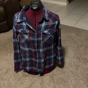 Woman’s red white and blue plaid flannel button up  shirtsize large